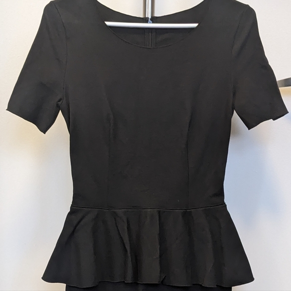 Dresses & Skirts - Stella McCartney Chic Black Peplum Mini Dress
